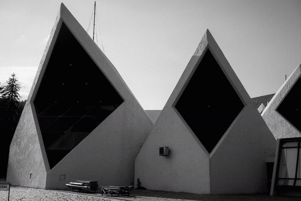Black and white: a building with pointed gables