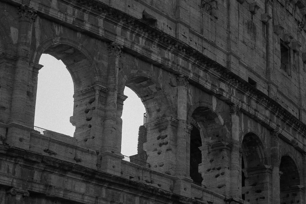 Black and white: the arches of the Colosseum, close.